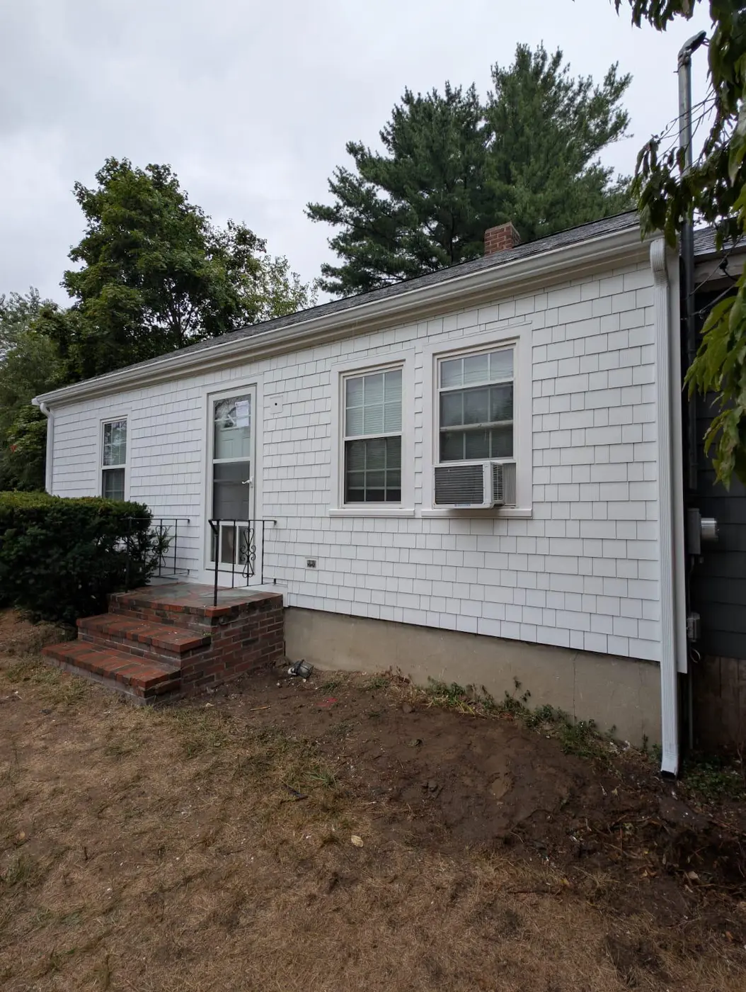 Massachusetts contractor performing a storm damage inspection Massachusetts after heavy rain