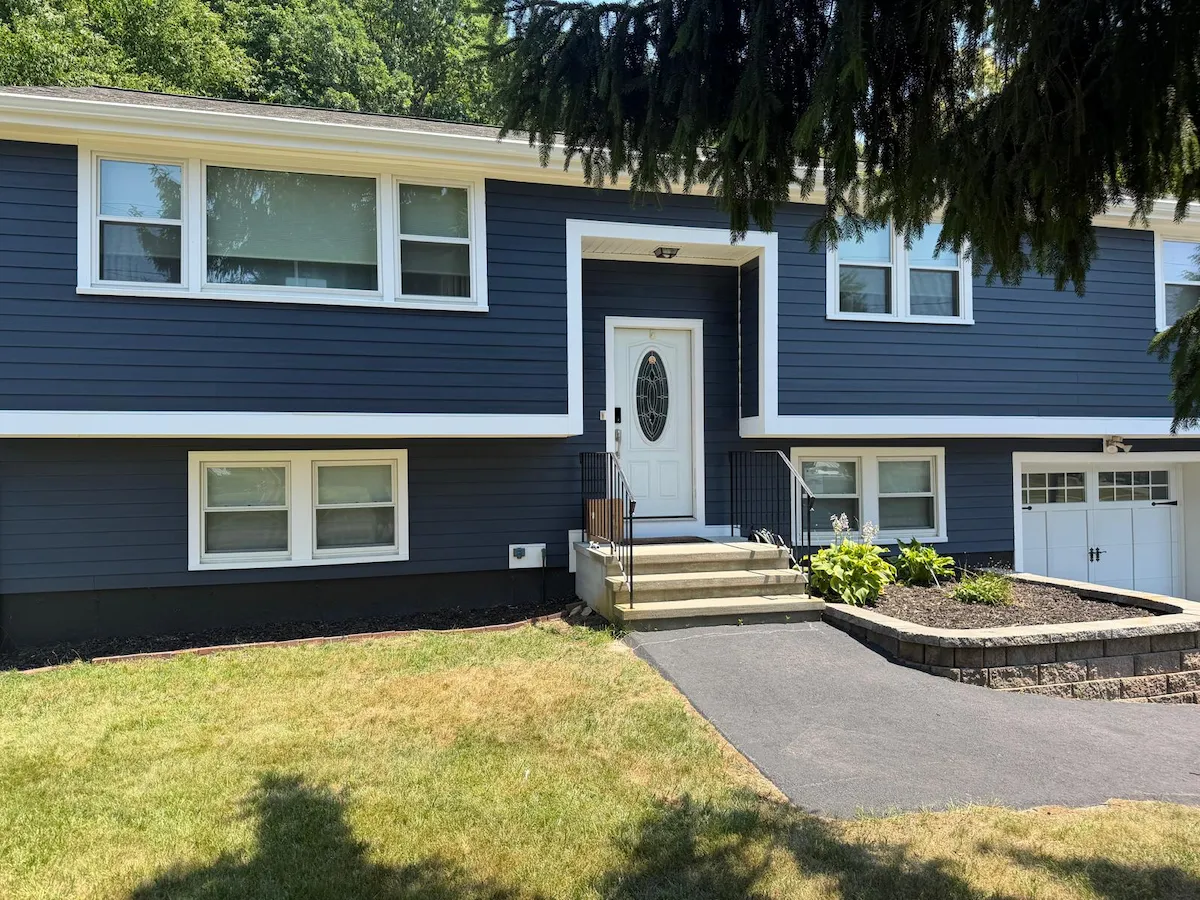 Front of Abington home with new blue HardiePlank siding