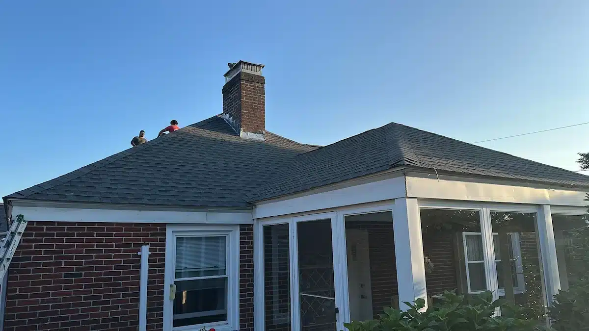  Roof-to-wall step flashing along a dormer on a Massachusetts home