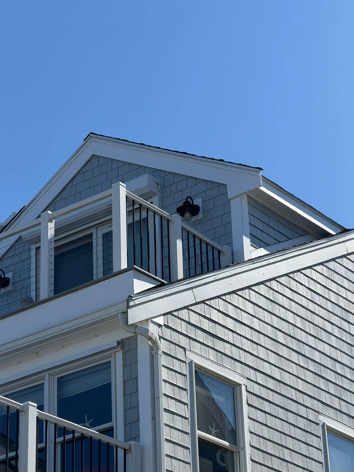 Completed upper front and side siding repairs on a home in Marshfield MA